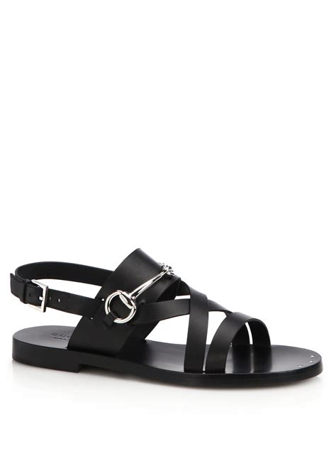 black gucci flat sandals